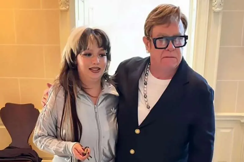 ELTON JOHN HANDS OVER HIS HOUSE KEYS TO LOLA YOUNG AFTER LOSING BET