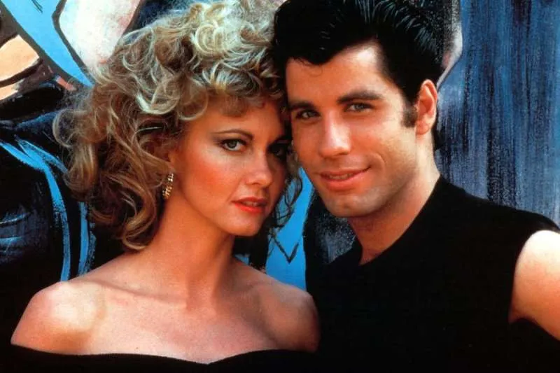 JOHN TRAVOLTA STUNS FANS BY RECREATING DANNY ZUKO AT GREASE SING-ALONG JOHN TRAVOLTA STUNS FANS BY RECREATING DANNY ZUKO AT GREASE SING-ALONG