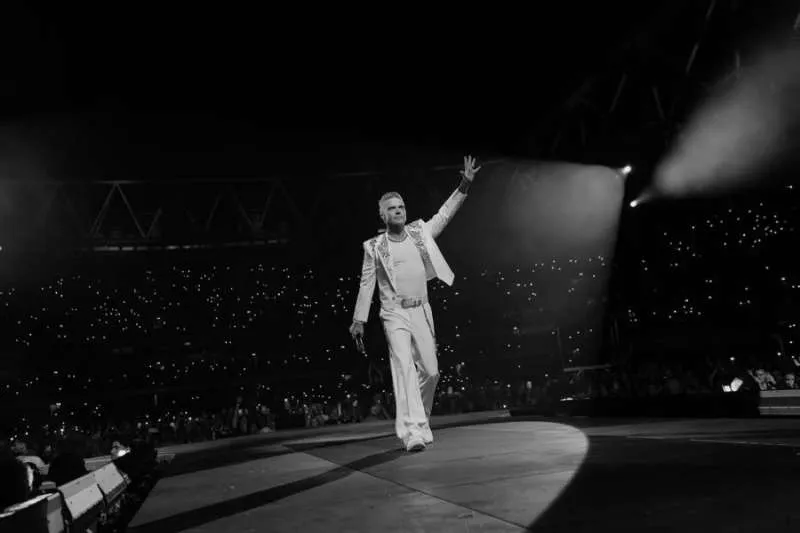 Robbie Williams Nominated for Knighthood After Decades of Music and Charity Work